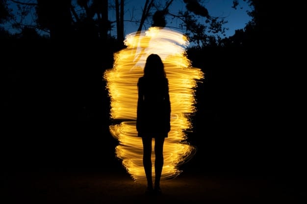 A person is visually represented breaking chains that symbolize stigma, with rays of light shining through. The image conveys hope and overcoming adversity related to mental health.