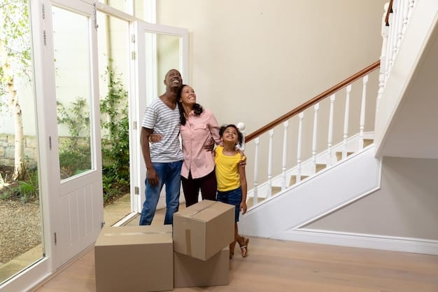 An image of a family happily moving into a new home. The family consists of a mother, a father, and two children. The house is modest but well-maintained, and the family is carrying boxes inside. The overall feeling should be one of joy and relief.