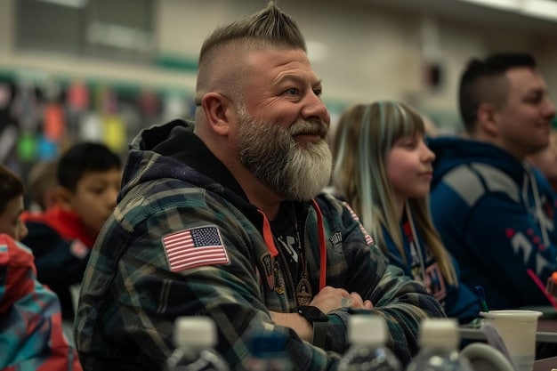 A US military veteran sitting in a college classroom, surrounded by other students. The veteran is engaged and taking notes, showing their commitment to their education. Books and laptops are on the desk, signifying the pursuit of knowledge.