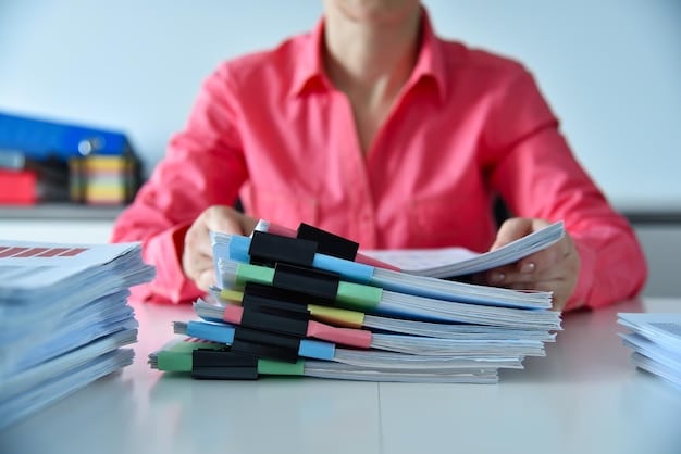 A person meticulously organizing receipts and financial documents into labelled folders, emphasizing the importance of accurate record-keeping for tax purposes.