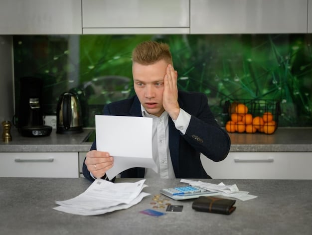 A worried person looking at a high energy bill, emphasizing the financial stress of utility costs. The scene is set at a kitchen table, with bills and financial papers scattered around, creating a sense of urgency.
