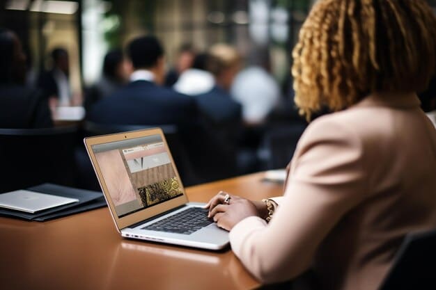 A person using a laptop to research available resources and programs for unemployment benefits extension. The focus is on the screen displaying various government websites and informational articles.