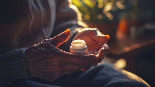 A close-up image showing a caregiver's hands gently assisting an elderly person with medication, emphasizing the delicate and attentive nature of in-home caregiving.